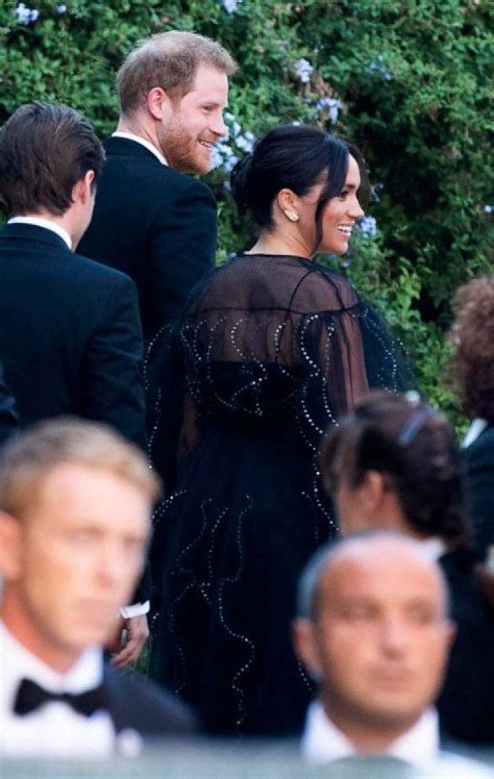 Meghan Markle Wears ‘Shocking’ $13,500 Black Valentino Gown To Misha Nonoo’s Wedding